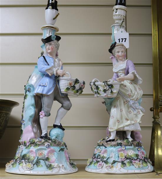 A pair of Sitzendorf candlesticks mounted as lamps, height without fittings 14.75in.